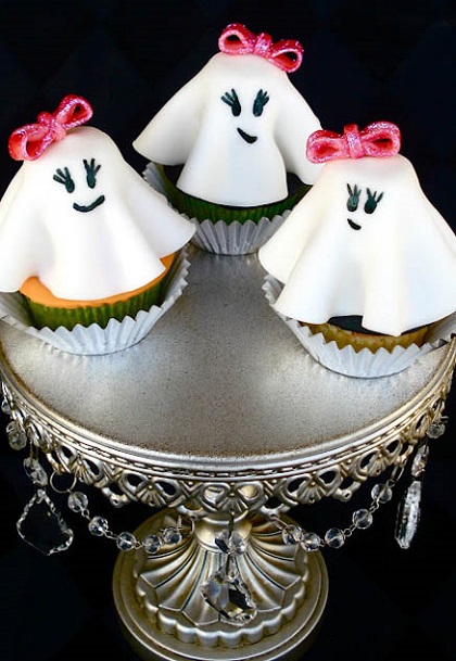cute halloween cupcakes in shape of girls ghosts with bowties