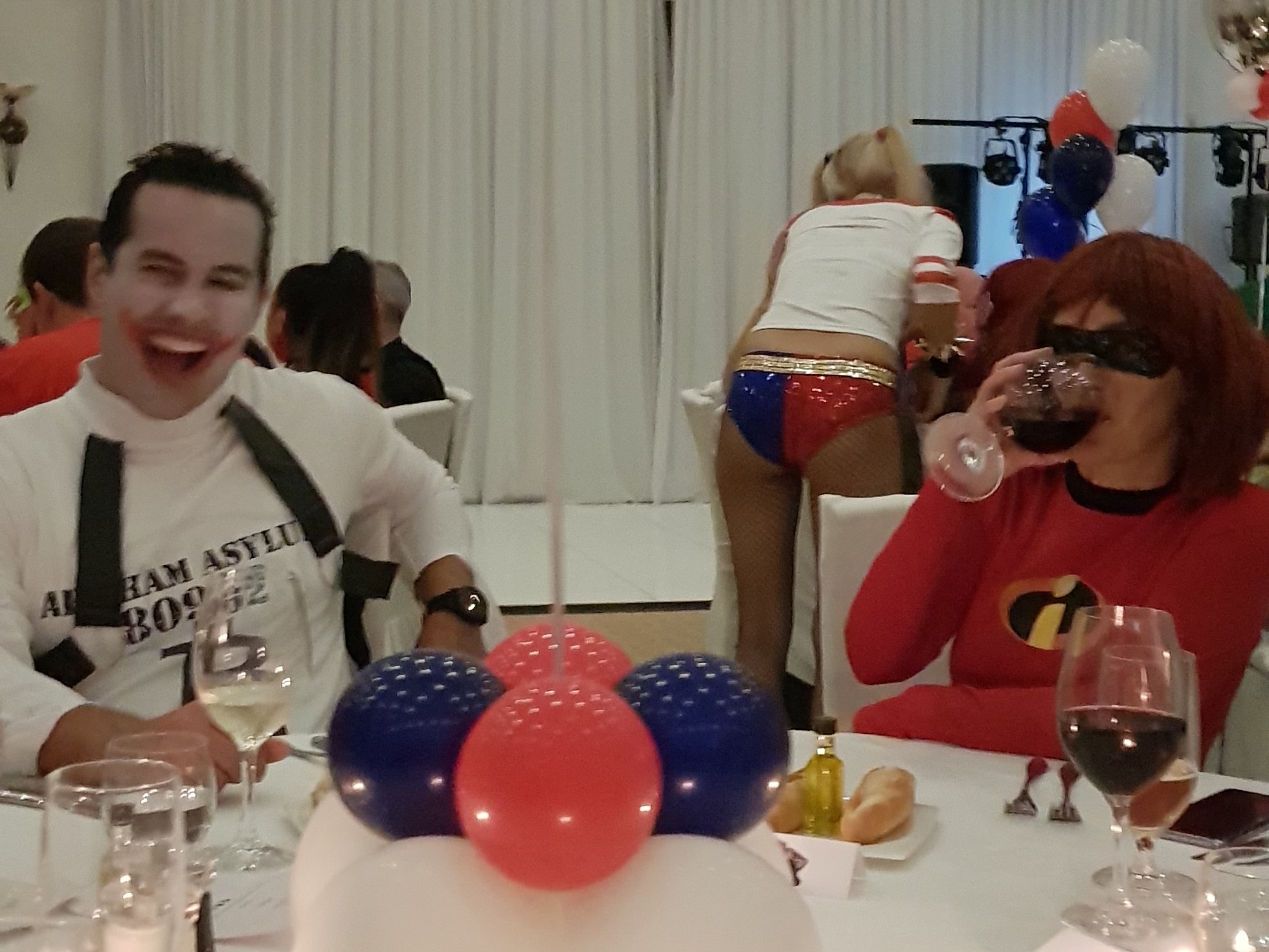 cosplay party with guests dressed as Harley Quinn and Joker
