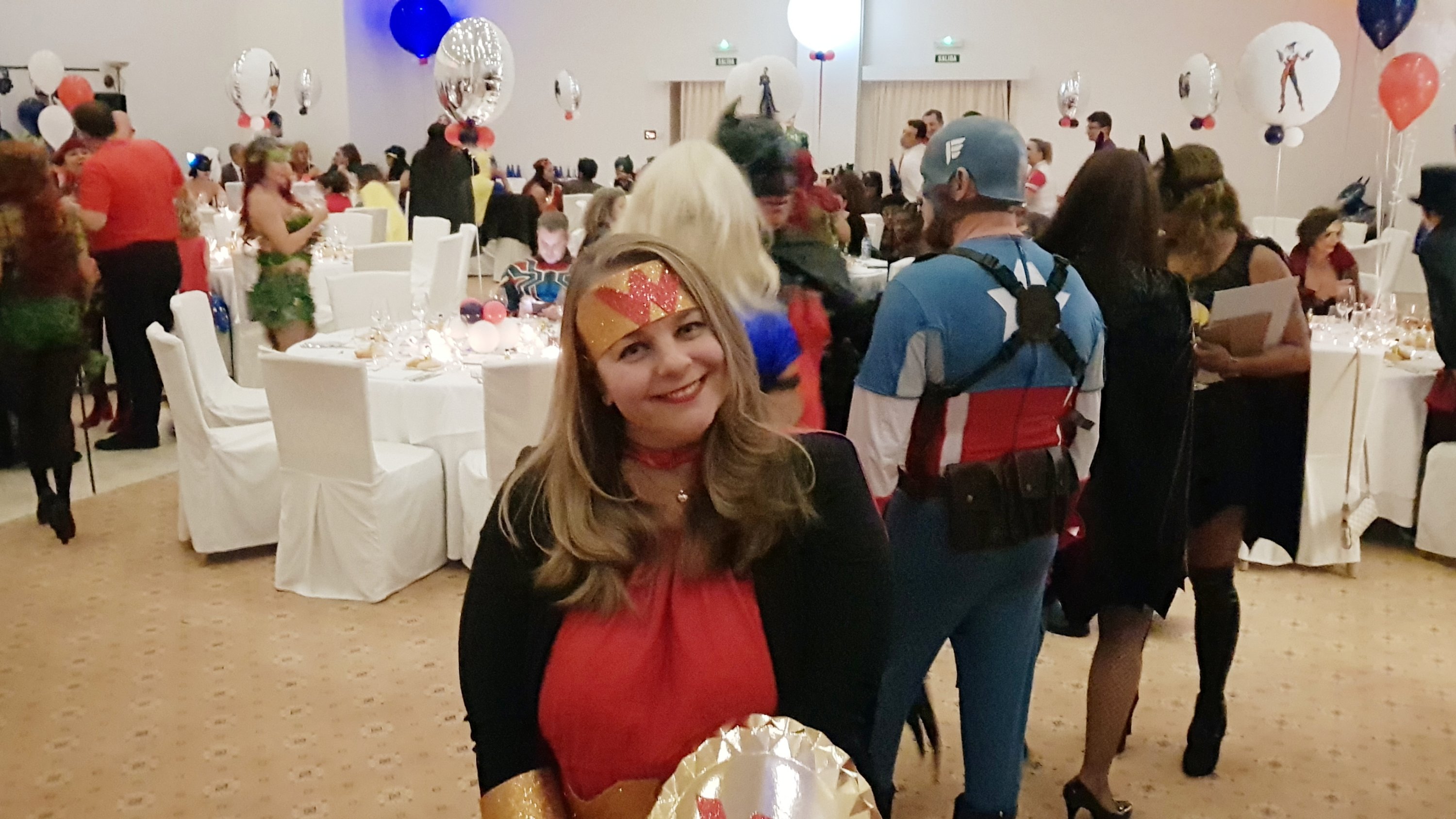 Costumes birthday party with a woman dressed as a Wonder woman in a diy costume