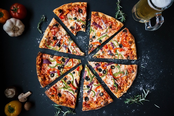 A Pizza because pizza night is among the unconventional rehearsal dinner ideas.